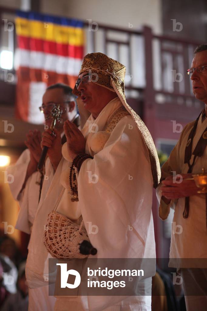 Prayer for Japan in the Paris great pagoda Paris France