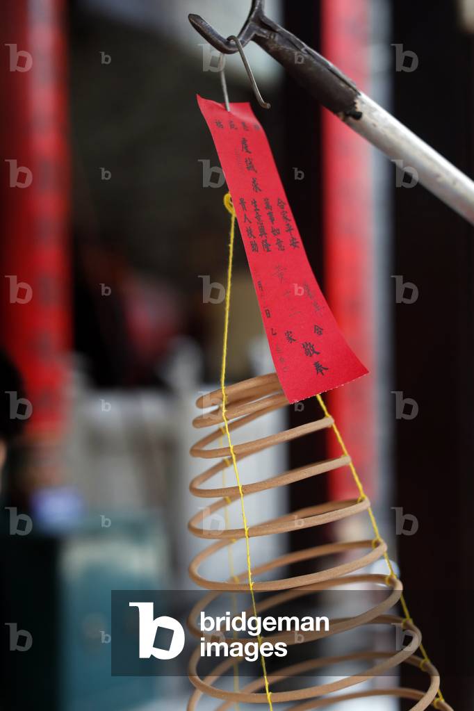 Taoist temple. Phuoc An Hoi Quan Pagoda. Spiral Incense stick.  Ho Chi Minh city. Vietnam.  (photo)