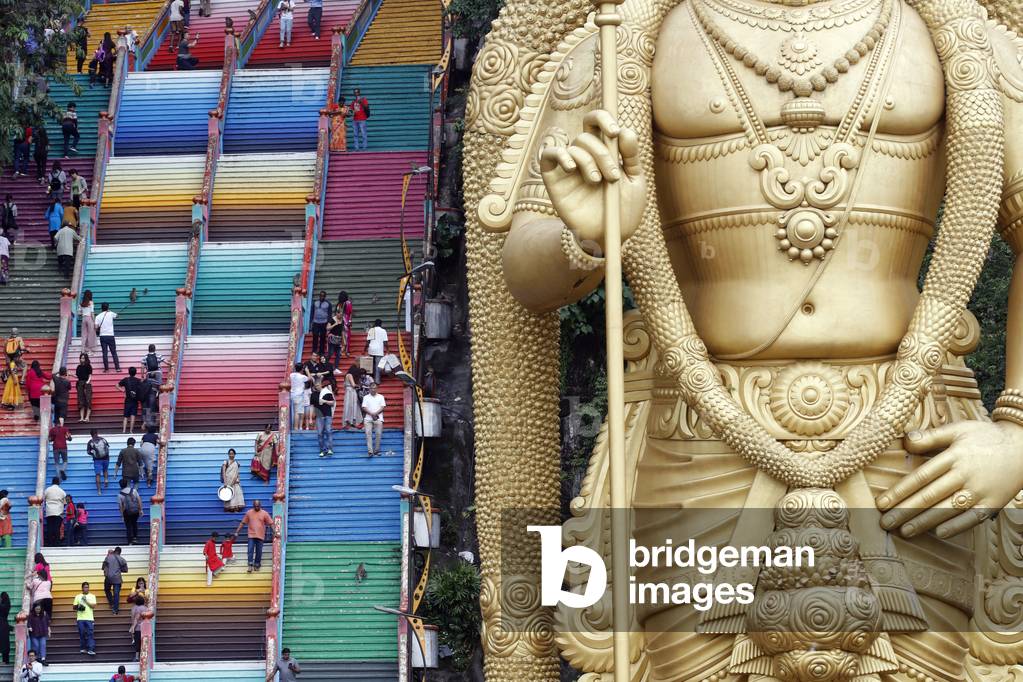 Murugan, the Hindu god of war, Hindu temple and shrine of Batu Caves, Entrance with the Murugan giant statue, Kuala Lumpur, Malaysia (photo)
