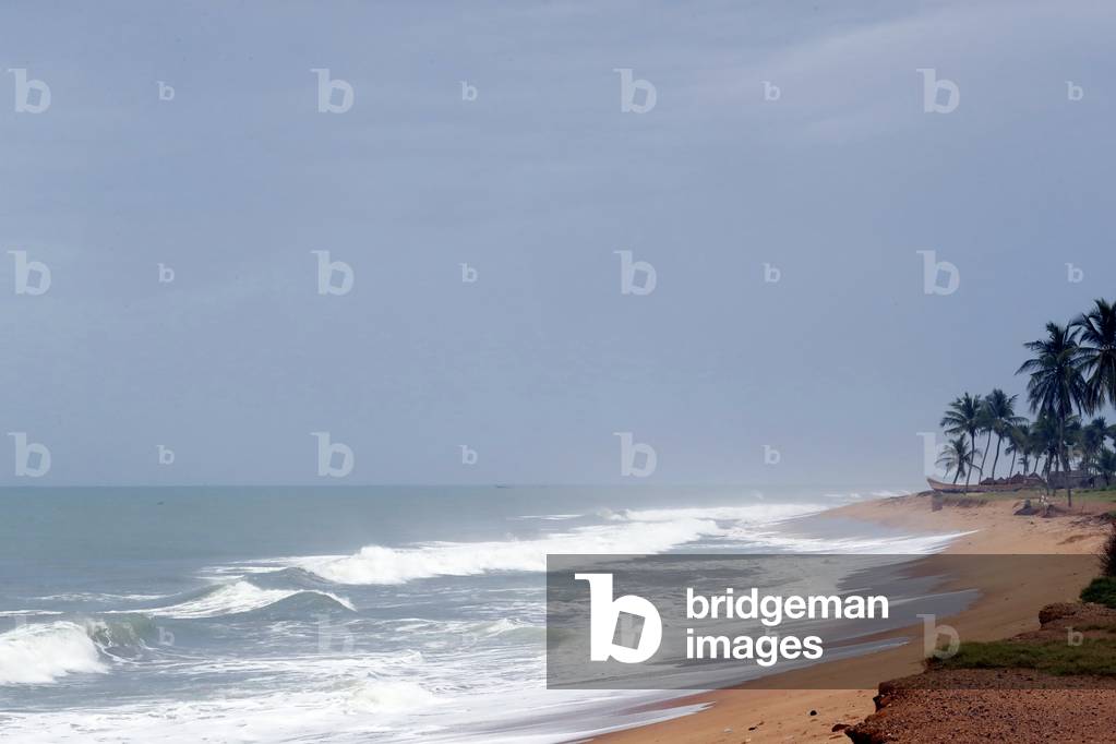 The ocean and a beach with palm trees, Aneho, Togo, 2019 (photo)