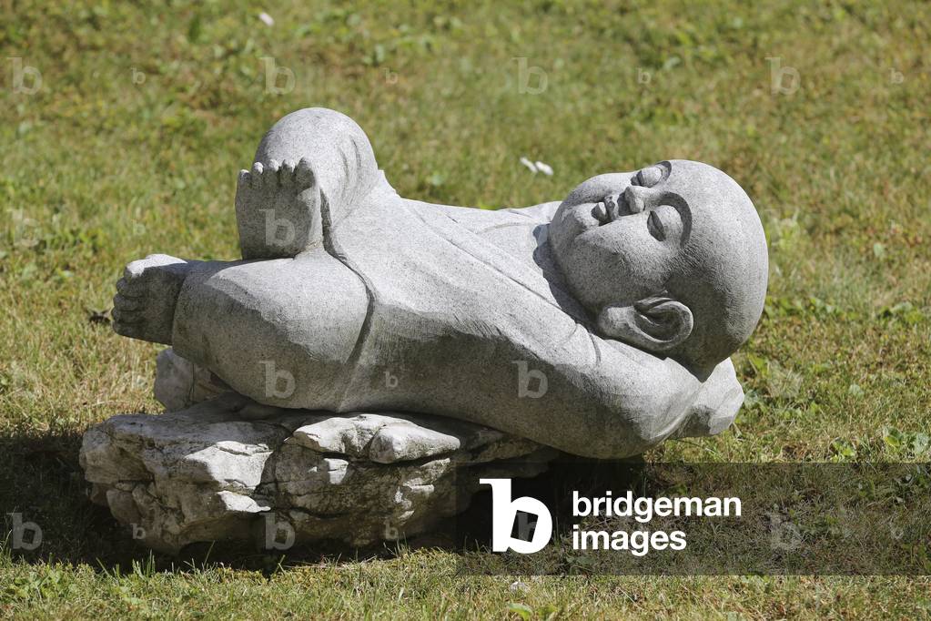 Geneva, Geneva, Switzerland, le 19/6/2015 - Fo Guang Shan temple. Novice monk statue.