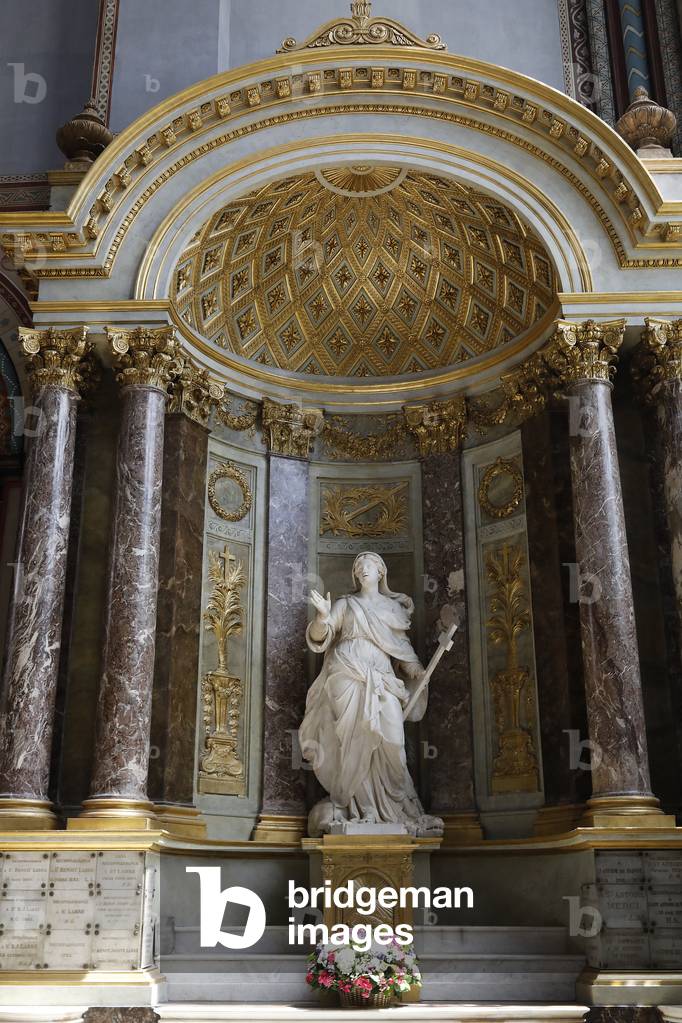 Saint Germain des Pres church, Paris, France. Martyr Sainte Margaret of antioch holding a cross by Jacques Bourlet, 1730.