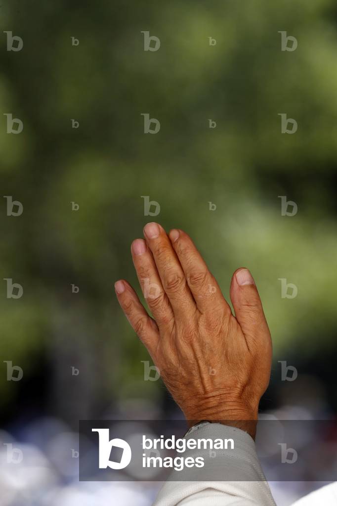 Catholic church during covid-19 epidemic. Catholic mass. Priest praying. 

 France.