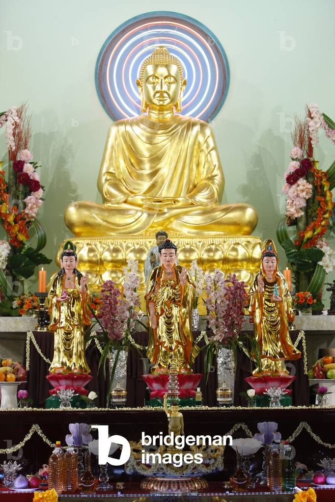 Buddha statue and altar in Khanh Anh temple , Evry, France