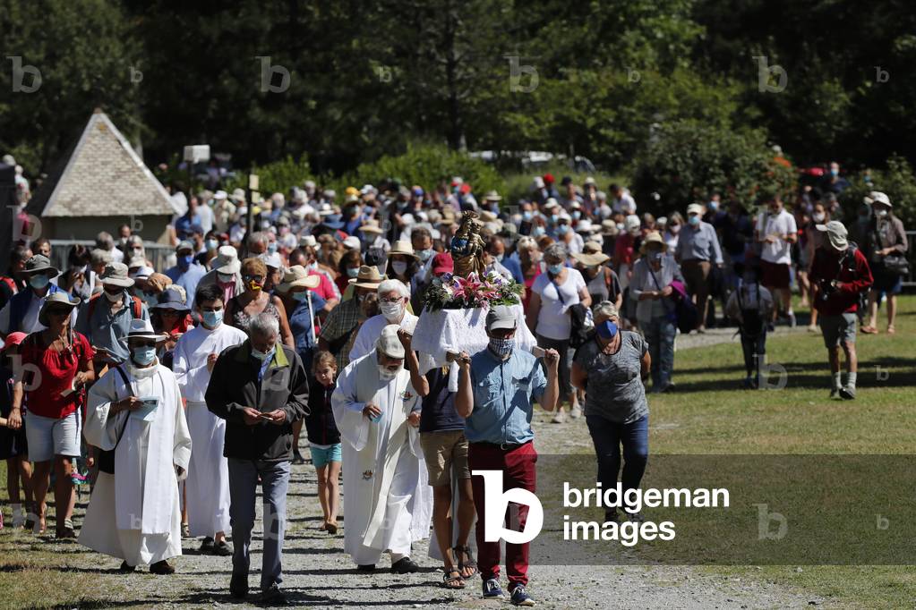 Catholic church during covid-19 epidemic. Assumption mass.  Notre Dame de la Gorge church.  France.