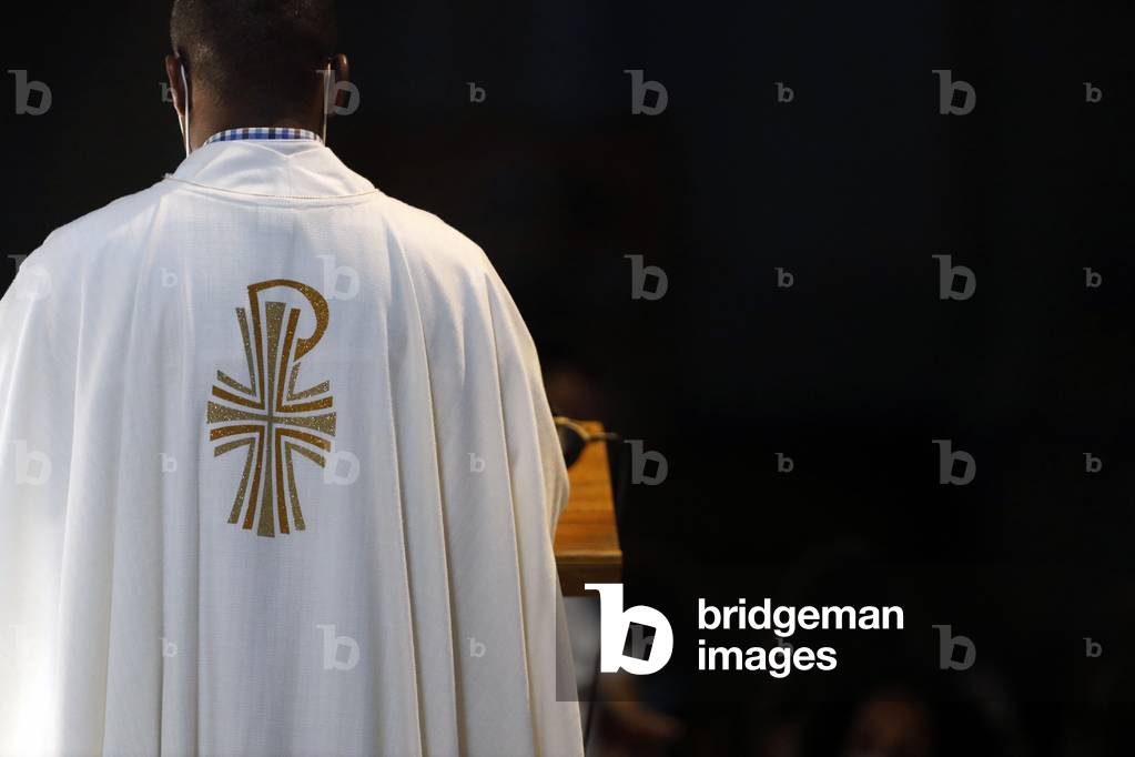 Catholic church during covid-19 epidemic. Sunday mass. Priest.  France.