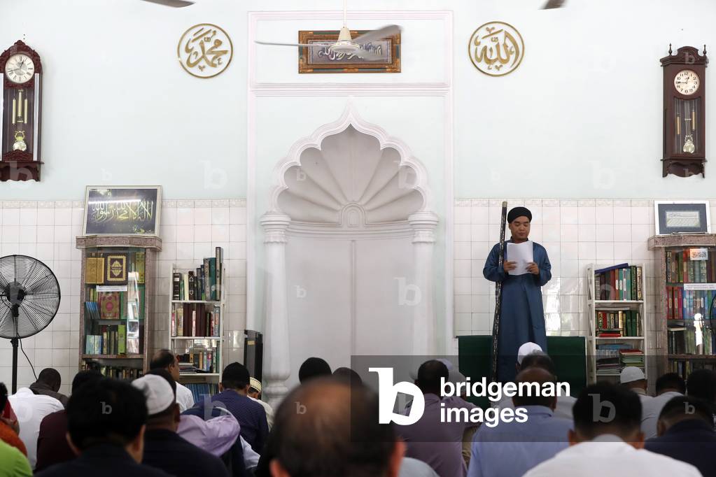 Saigon Central Mosque, The friday prayer is  a congregational prayer (salat) that Muslims hold every Friday,  Imam's sermon ( Khutbah), Ho Chi Minh City, Vietnam (photo)