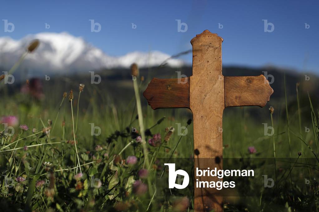 Wooden Christian cross in nature.  Combloux. France.