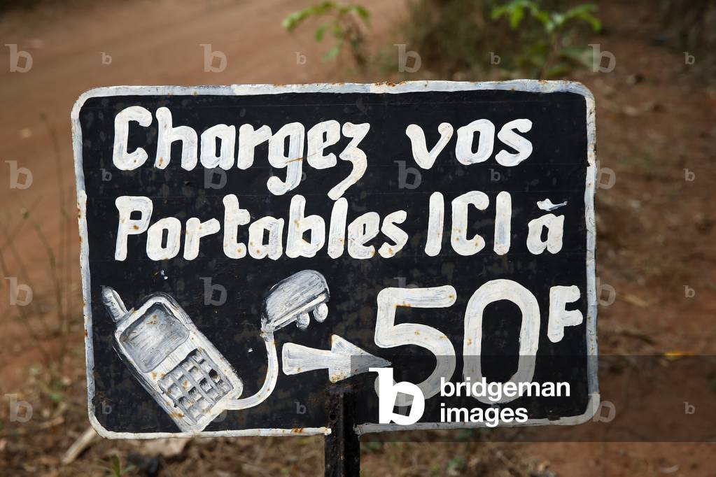 Cell phone powering ad in Benin, Africa (photo)