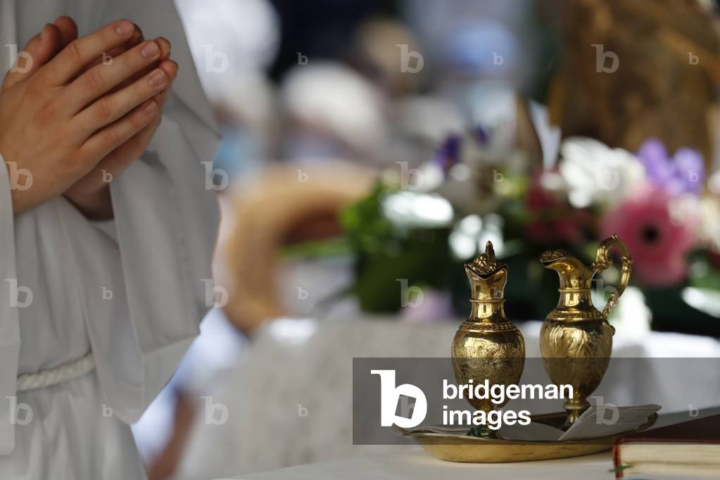 Catholic church during covid-19 epidemic. Sunday mass. Holy Communion.  France.