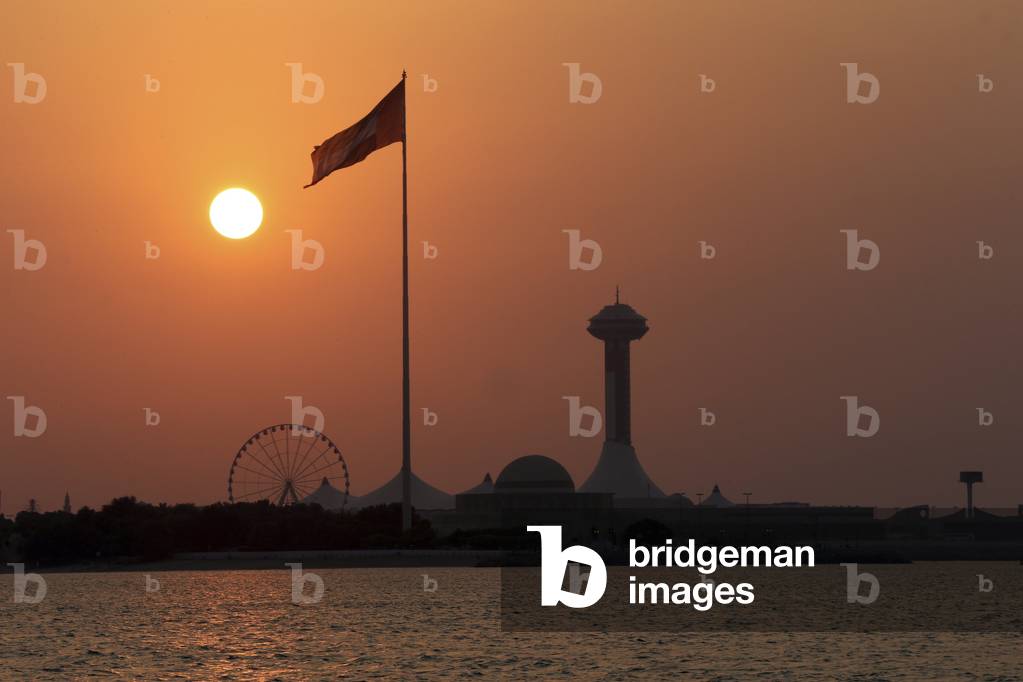 20151021, Abu Dhabi, United Arab Emirates : Abu Dhabi waterfront and Breakwater Tower at sunset