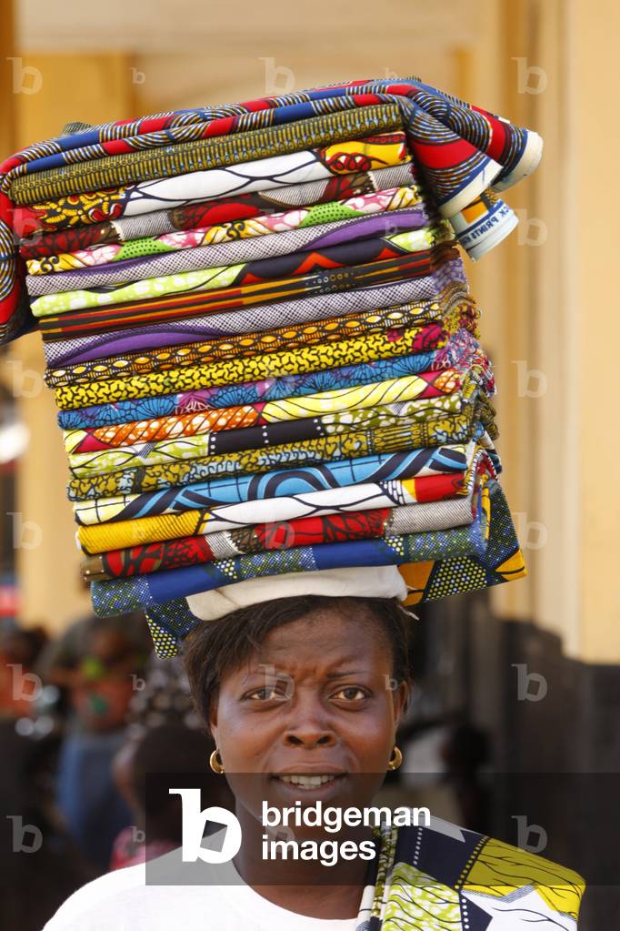 Woman selling loincloths, Lome, Togo