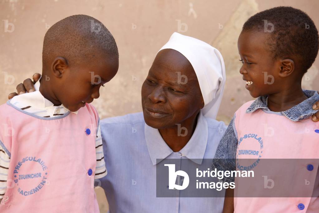 Catholic kindergarten pupils and teacher, Ziguinchor, Senegal