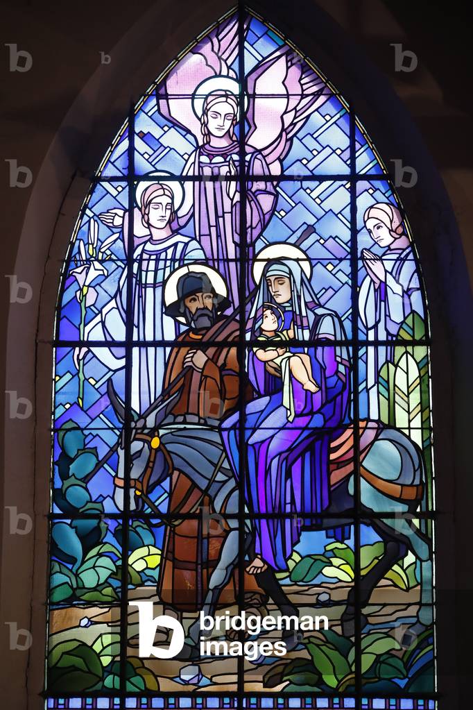 Saint-Joseph church, The Flight into Egypt, Holy Family, Stained glass window by Raphael Lardeur, Chedde, France (photo)