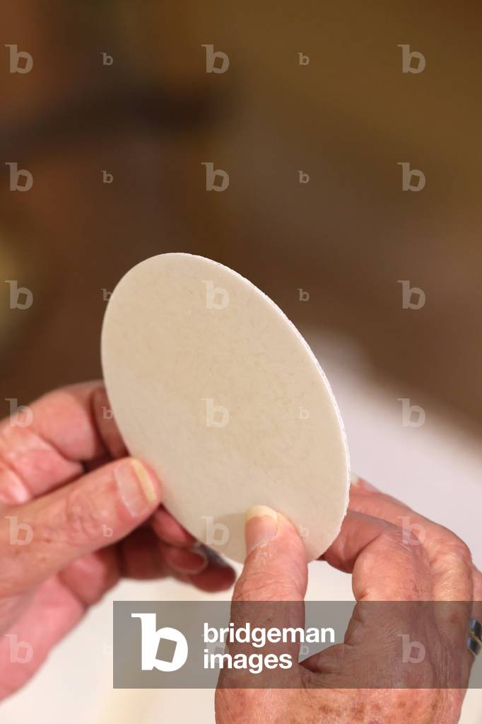 Catholic church during covid-19 epidemic. Sunday mass. Eucharistic celebration.  Sanctuary of La Benite Fontaine. France.
