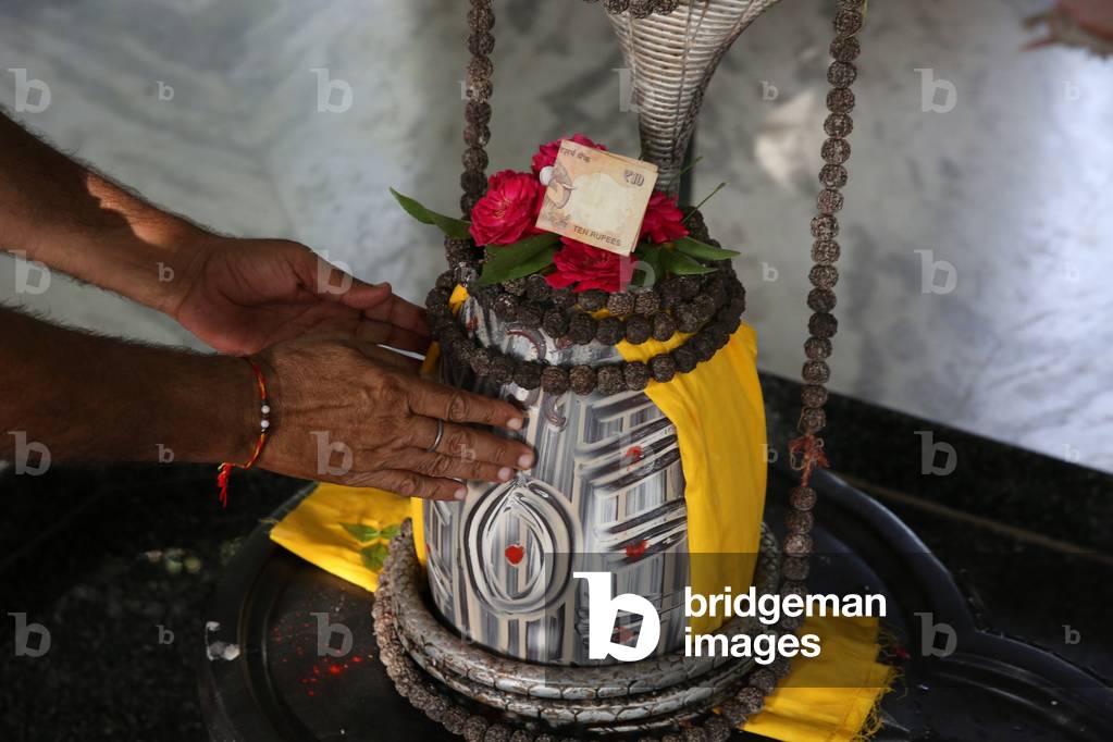 Devotion in Raman Reti hindu temple. India