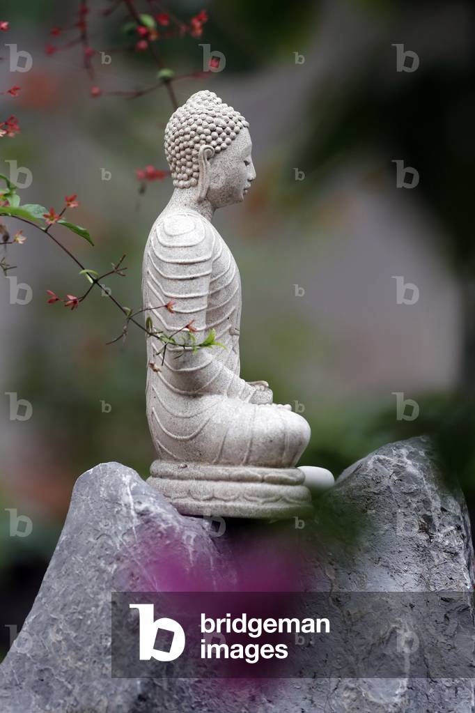 Stone Buddha statue, Hoi An, Vietnam, 2019 (photo)