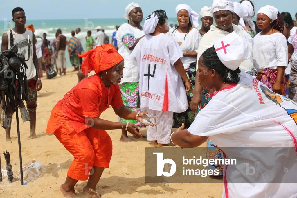 Voodoo cult on a beach in Cotonou, Benin (photo)