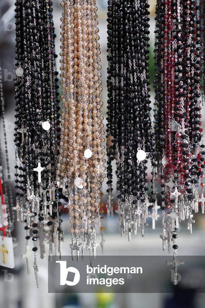 Various prayer beads for sale in catholic shop,  Ho Chi Minh City, Vietnam (photo)