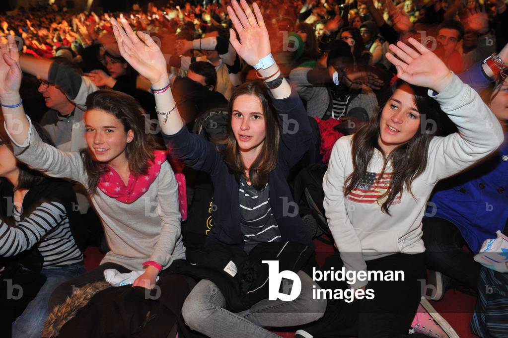 Celebration in the basilica Saint-Pie X during the yearly gathering of young christians, members of the FRAT, in the city of Lourdes ,