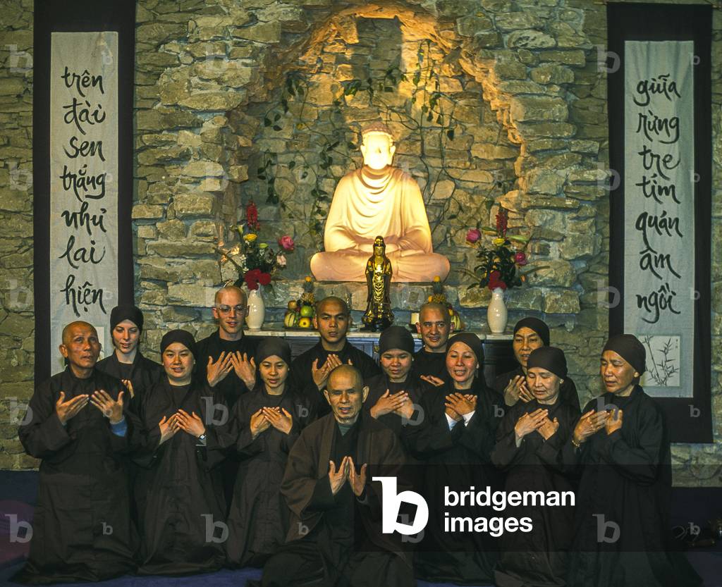 Thich Nhat Hanh with newly ordained monks and nuns in Plum Village buddhist community, 2022 (photo)