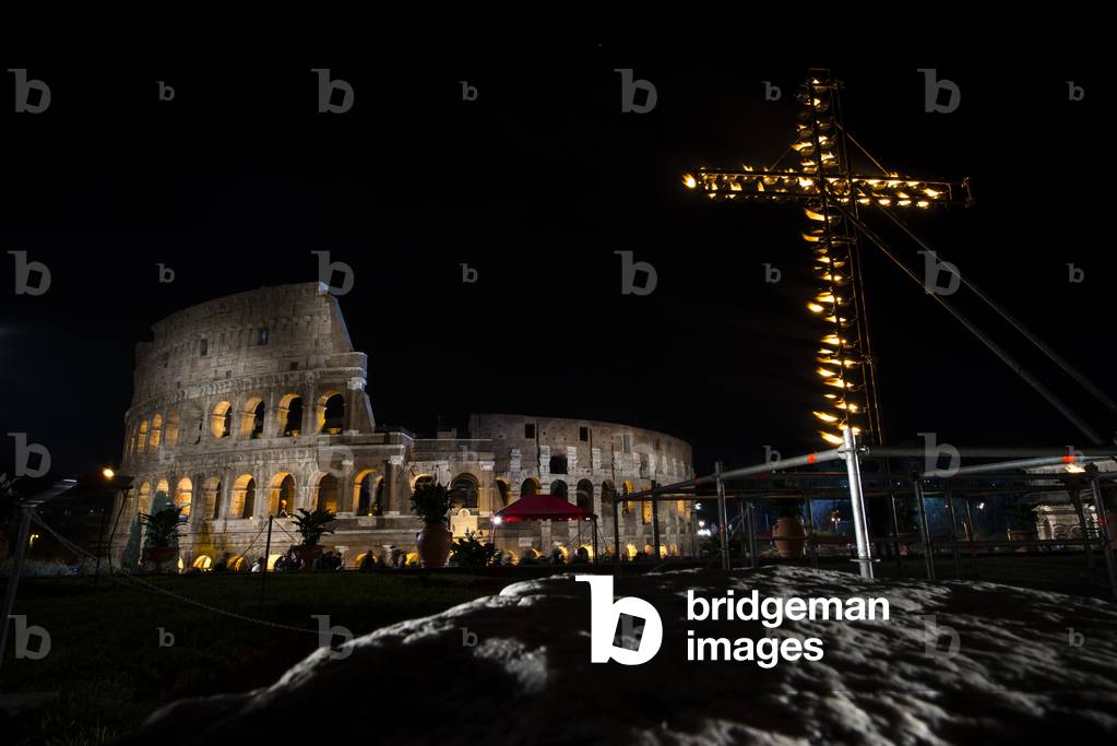 Via Crucis (Way of the Cross) torchlight procession on Good Friday in front of the Colosseum in Rome, Italy, 2016 (photo)