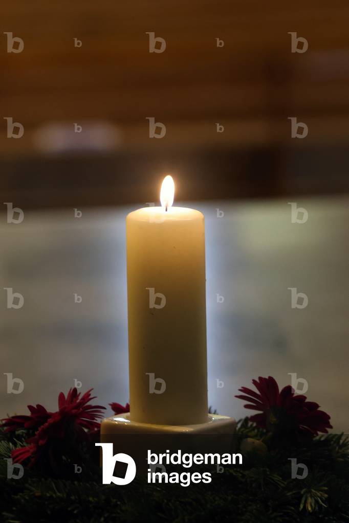 Advent candle in church.  Annecy. France.