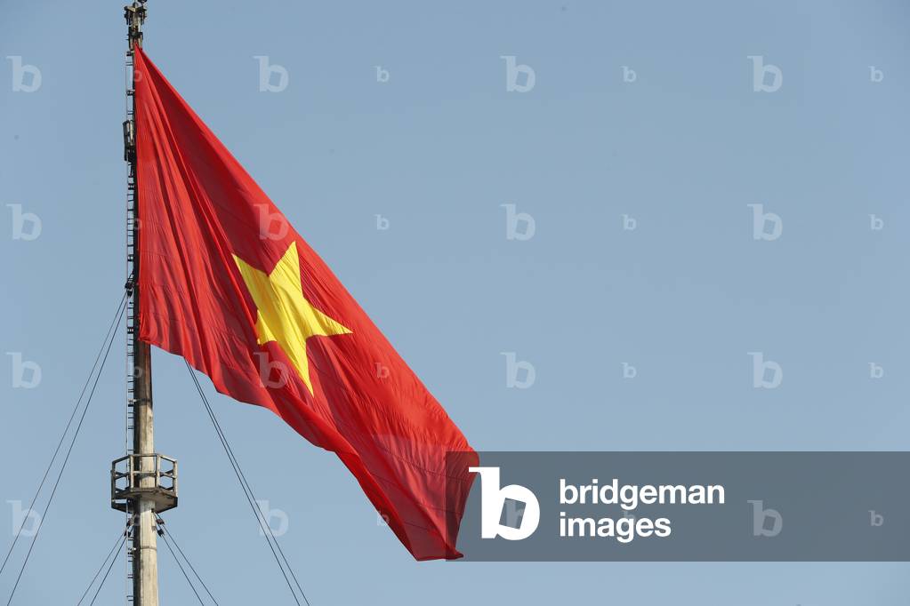 The imperial city, Vietnamese flag on the citadel, Hue, Vietnam, 2019 (photo)