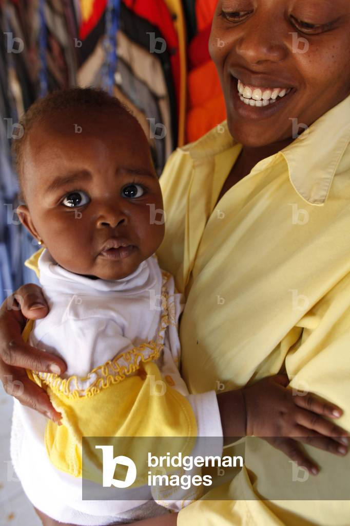 Kenyan mother holding her baby Embu Kenya