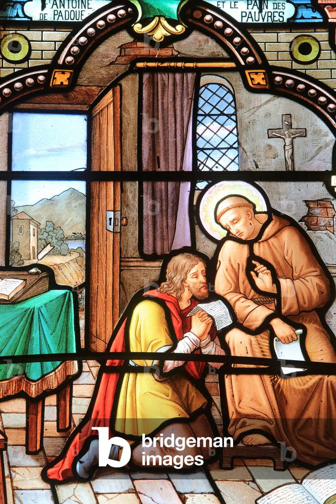 St. Anthony of Padua confessing penitent. Stained glass window. Shrine of Our Lady of la Salette, La Salette-Fallavaux, France