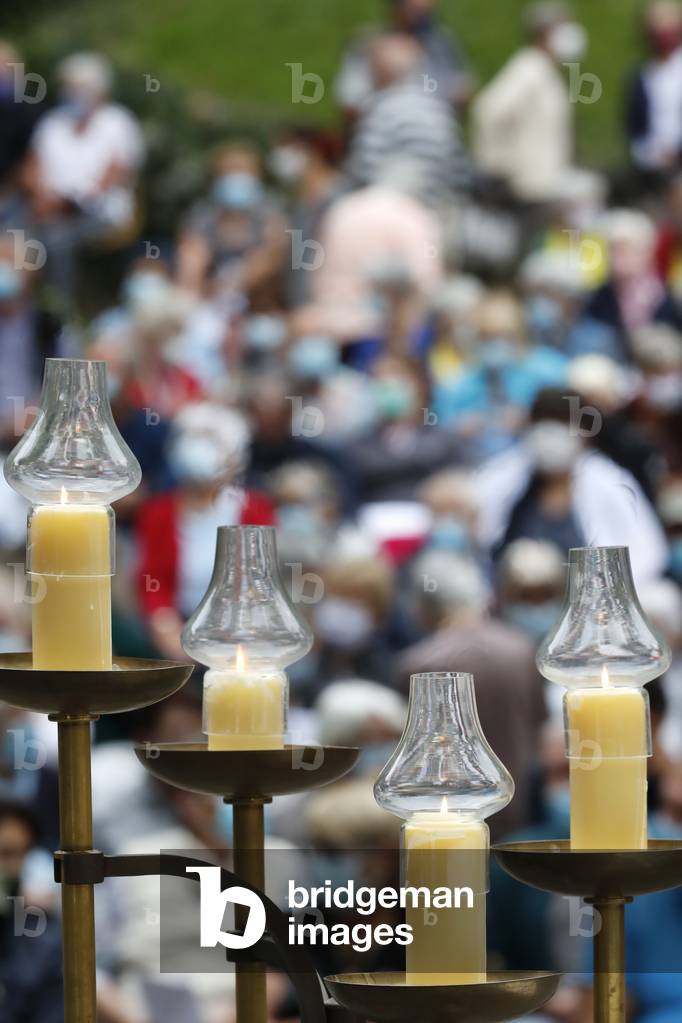 Catholic church during covid-19 epidemic. Celebration of the mass.  Sanctuary of La Benite Fontaine. France.