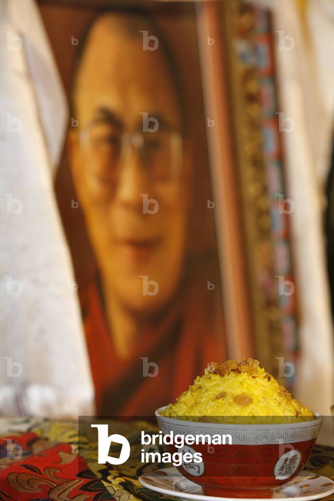 Offering and picture of the Dala Lama, Paris, France