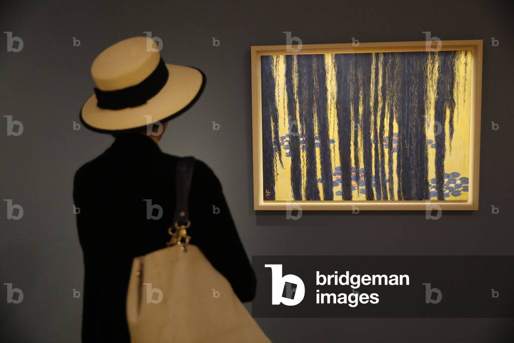 Woman looking at a nihonga by Hiramatsu Reiji, Musee des Impressionismes, Giverny, France (photo)