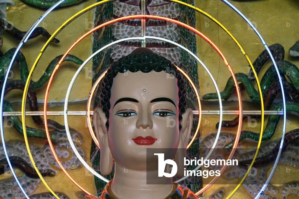 Van Hanh zen buddhist monastery. Buddha statue with neon circles. Dalat. Vietnam