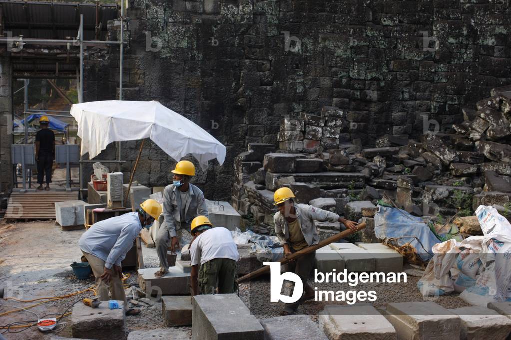 A team of archaeologist works to rebuild the Bayon, Siem Reap, Cambodia