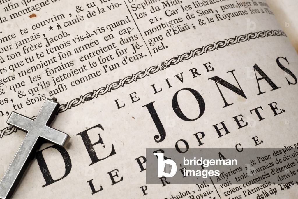 Old Bible in french, 18th century, Old Testament, The Book of Jonah, Christian cross, France (photo)