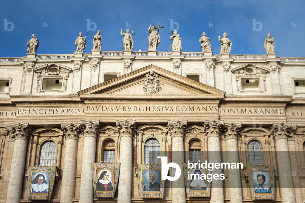 Tapestries of the new Saint (from L) Brazilian Dulce Lopes Pontes, Italian Giuseppina Vannini, English John Henry Newman, Indian Maria Teresa Chiramel Mankidiyan and Swiss Margarita Bays are displayed durint their Canonization Mass In Saint Peter's square at the Vatican.
