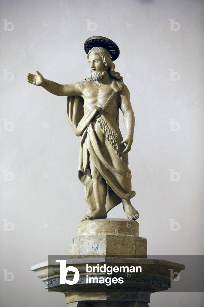 St John the Baptist statue on the baptistery of Maria SS, Assunta church in Surrano, Italy (photo)