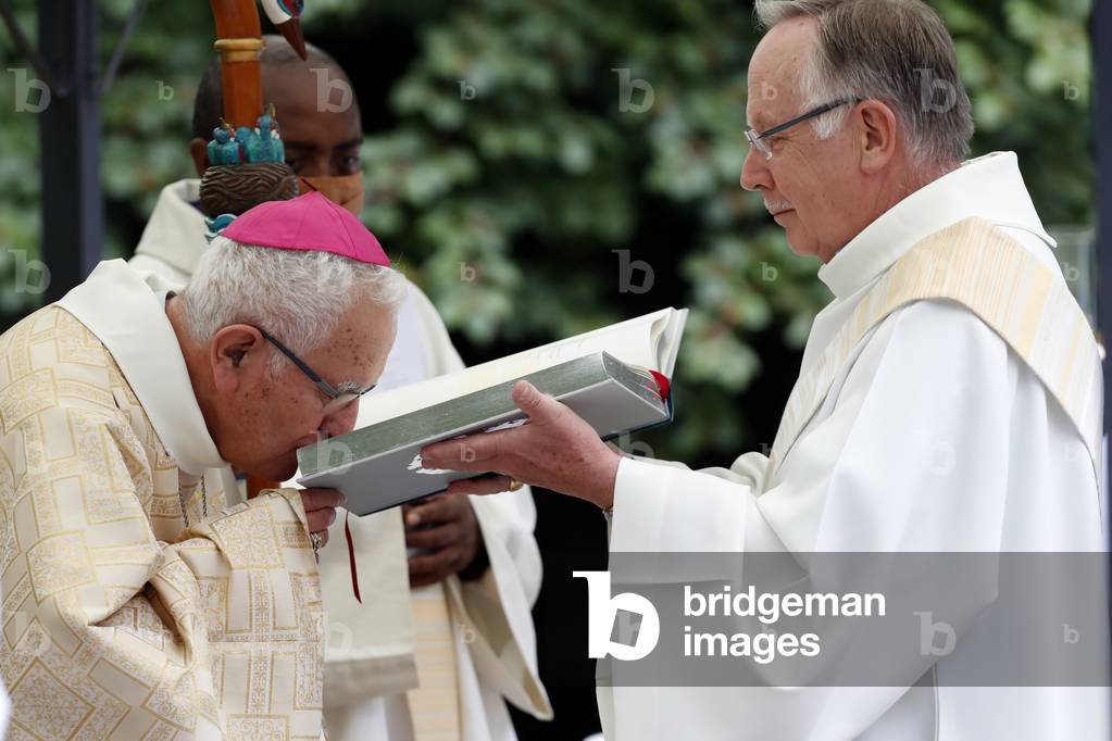 Catholic church during covid-19 epidemic.  Celebration of the mass.   Bishop.  Mgr Yves Boivineau.  Sanctuary of La Benite Fontaine. France.