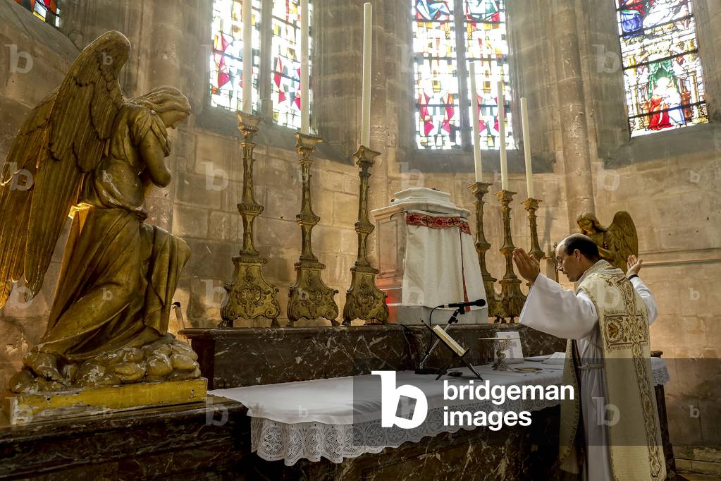 Mass in St Nicolas's church, Beaumont le Roger, France during 2019 lockdown.