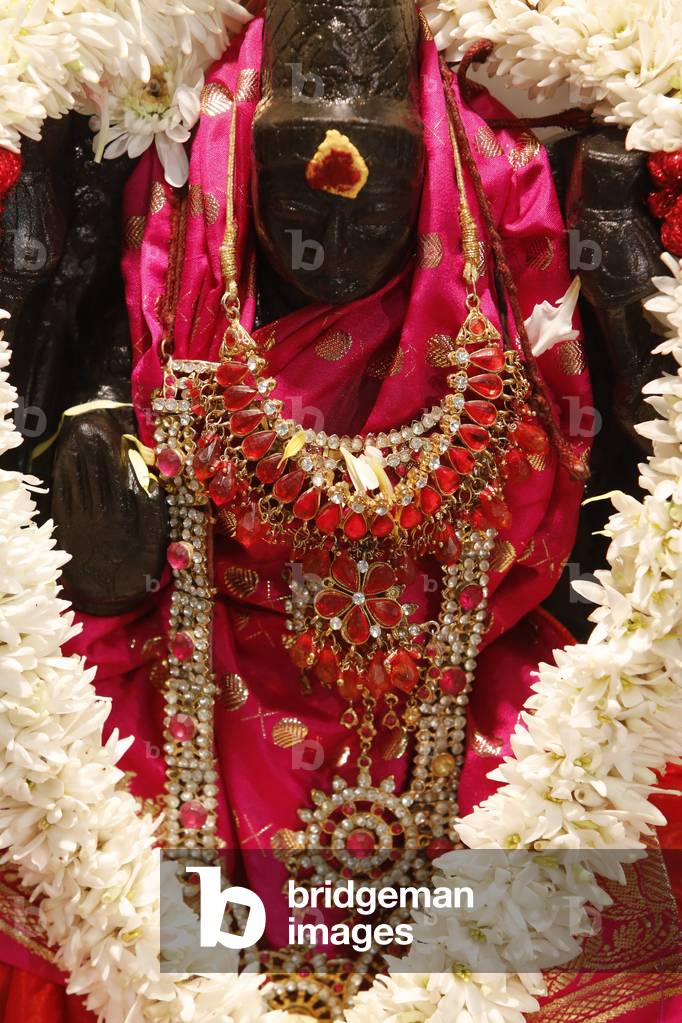 Diwali celebration at the Paris Ganesh temple - Statue of HariHara (fusion of Vishnu and Shiva), Paris, France