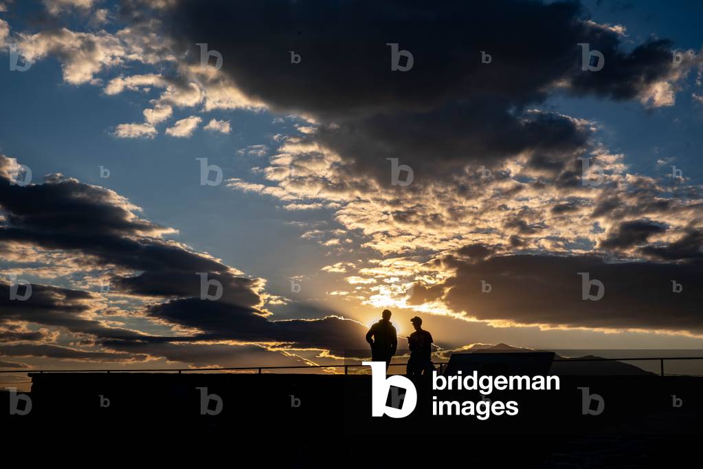 Figures at dusk, Prizren, Kosovo, 2018 (photo)