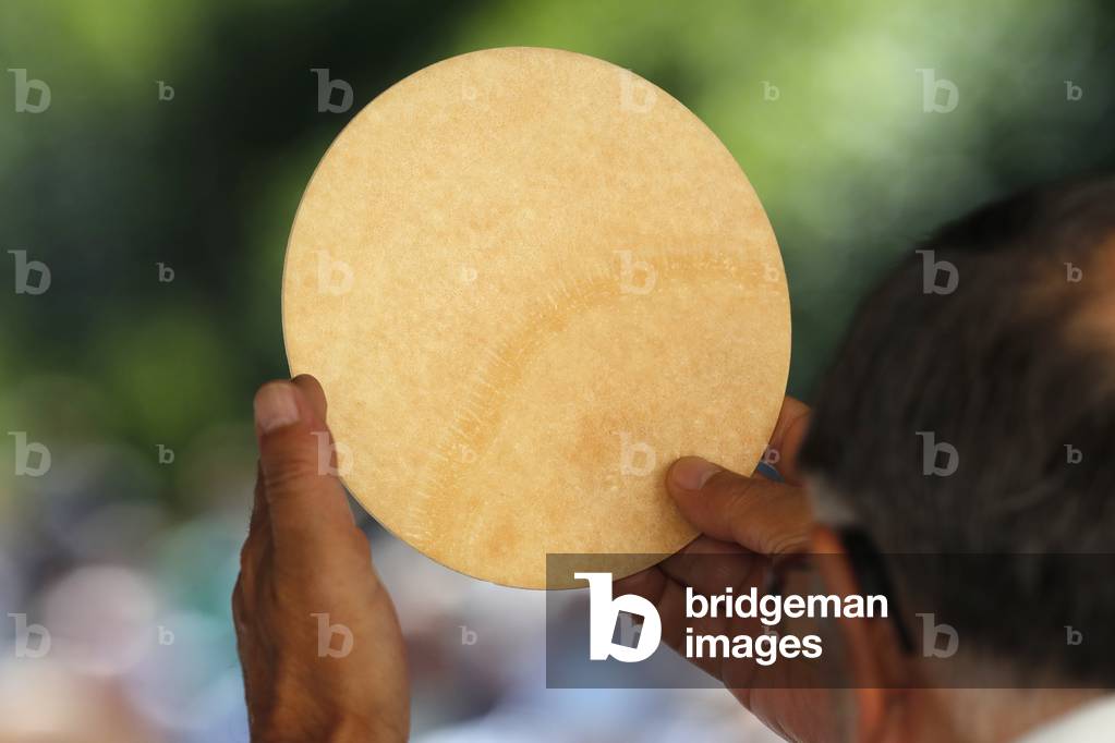 Catholic church during covid-19 epidemic. Sunday mass. Holy Communion.  France.