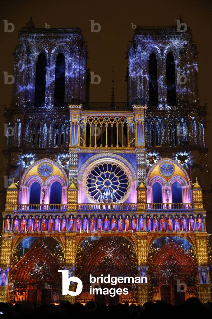 Sound and light show at Notre Dame de Paris cathedral, France (photo)