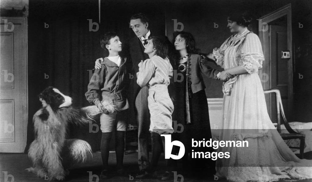 Scene from Peter Pan by JM Barrie with Gerard du Maurier as Mr Darling, Dorothea Baird as Mrs Darling, Arthur Lupino as Nana the dog, George Hersee as John Darling, W Geoghegan as Michael Darling and Hilda Trevelyan as Wendy Darling