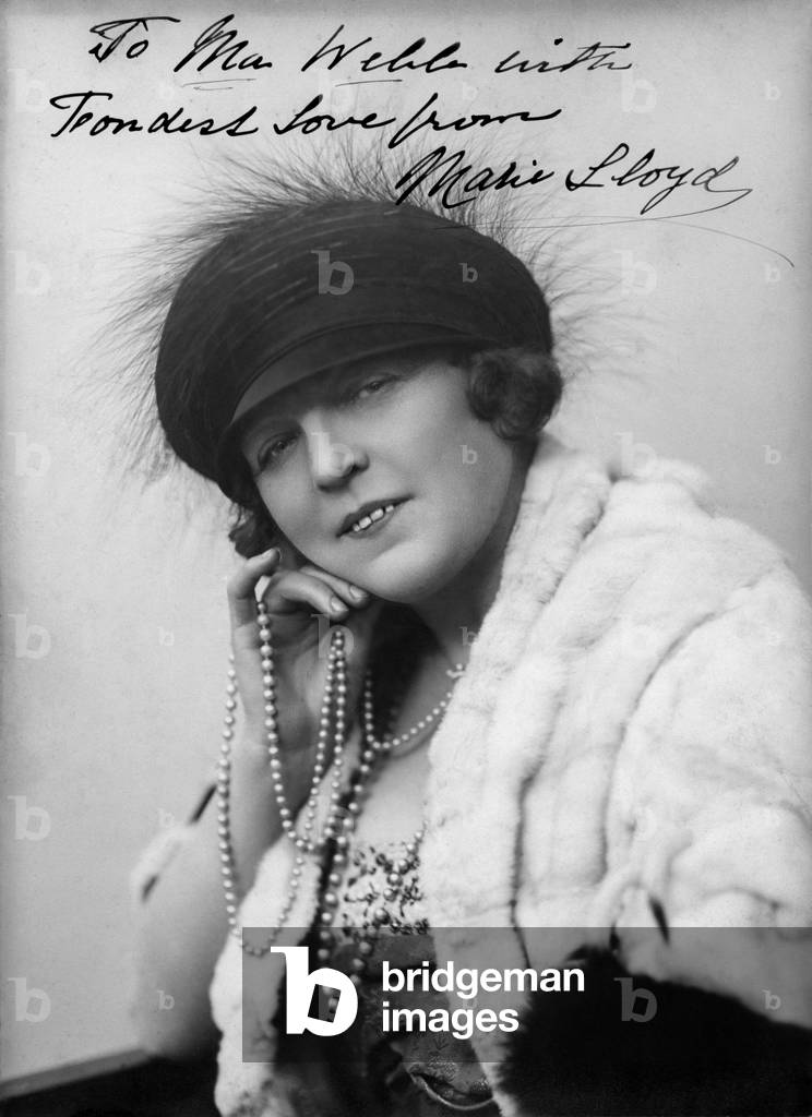 Marie Lloyd, née Matilda Alice Victoria Wood, wearing fur and pearls
