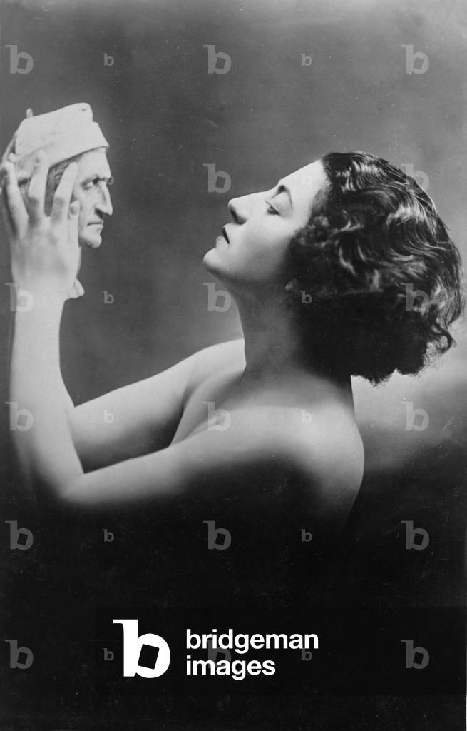 Jose Collins portrait holding mask