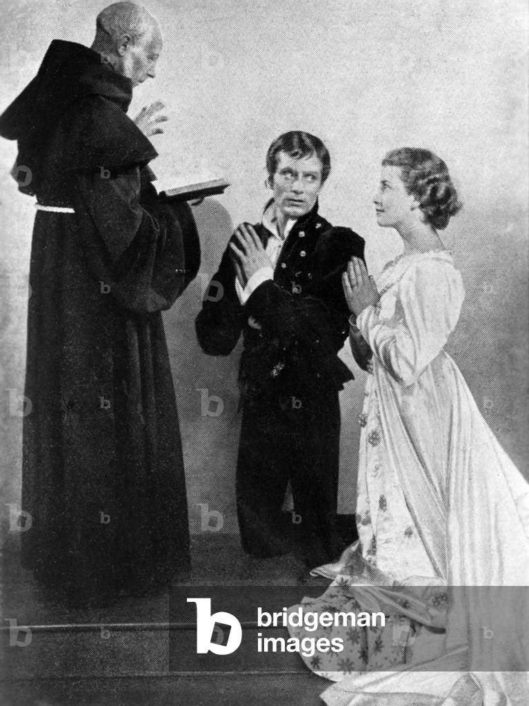 Lawrence Olivier, Peggy Ashcroft and George Howe as Romeo, Juliet and Friar Laurence  in the 1946 Old Vic production of William Shakespeare's 'Romeo and Juliet'