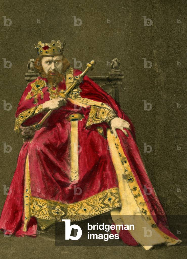 Sir Herbert Beerbohm Tree as King John with a sceptre on his throne in William Shakespeare 's 'King John'