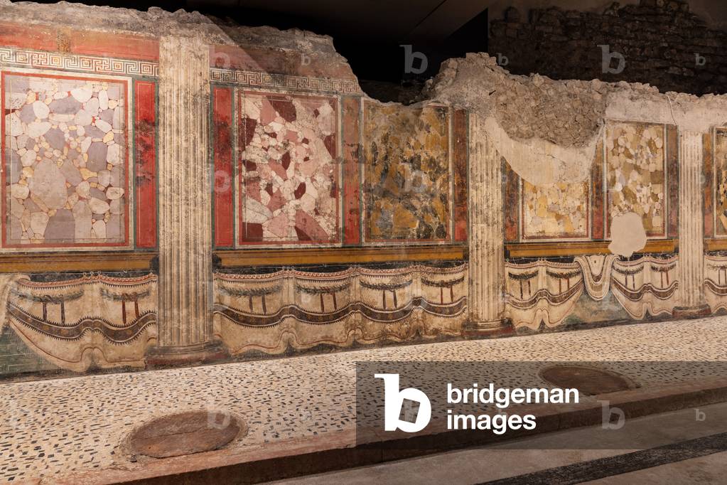 The Sanctuary of the Republican age (I century BC): one of the halls whose walls are decorated with beautiful frescoes and slabs, The archaeological area of the Capitolium in the ancient Brixia, Unesco heritage since 2011, Brescia